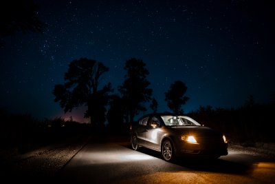 Car in the night with headlights